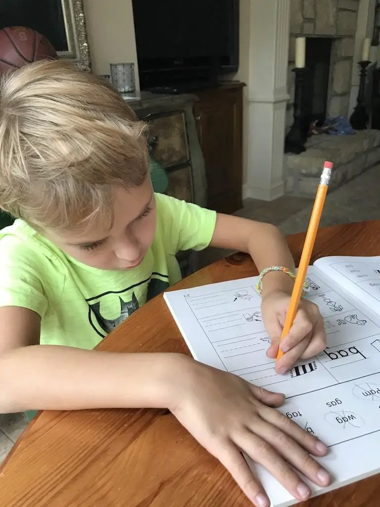 Homeschool sick days are inevitable and can lead to feeling overwhelmed! After 15 years homeschooling, here are my tips for getting through sick days!