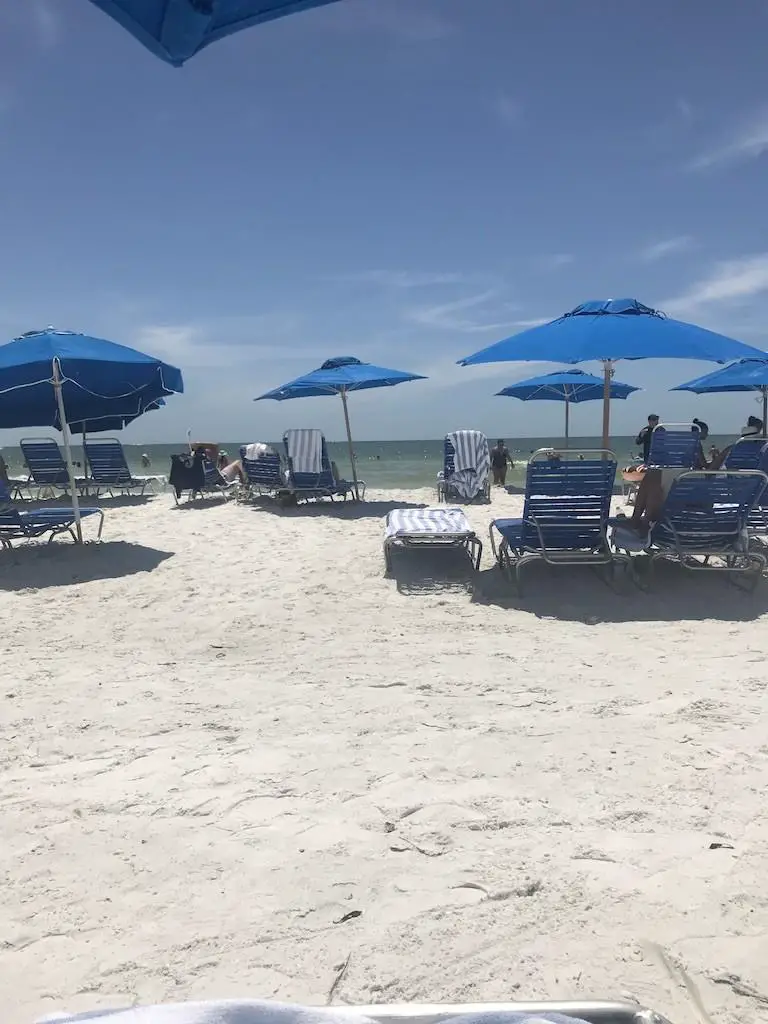 Guest Chairs and Umbrellas on the beach at the JW Marriott Marco Island Beach Resort