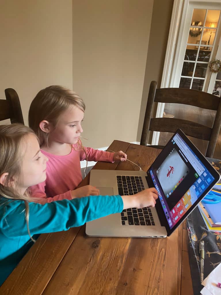Girls playing on online homeschool game